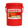 Red Sinopec oil container with a label on a white background